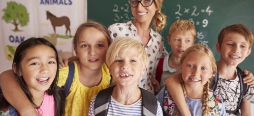 portrait-of-school-children-with-teacher-1536x1025